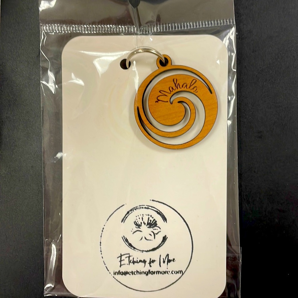 Carved wooden pendant